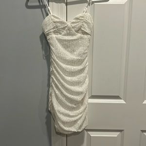Hello Molly, white mini dress with sparkles!